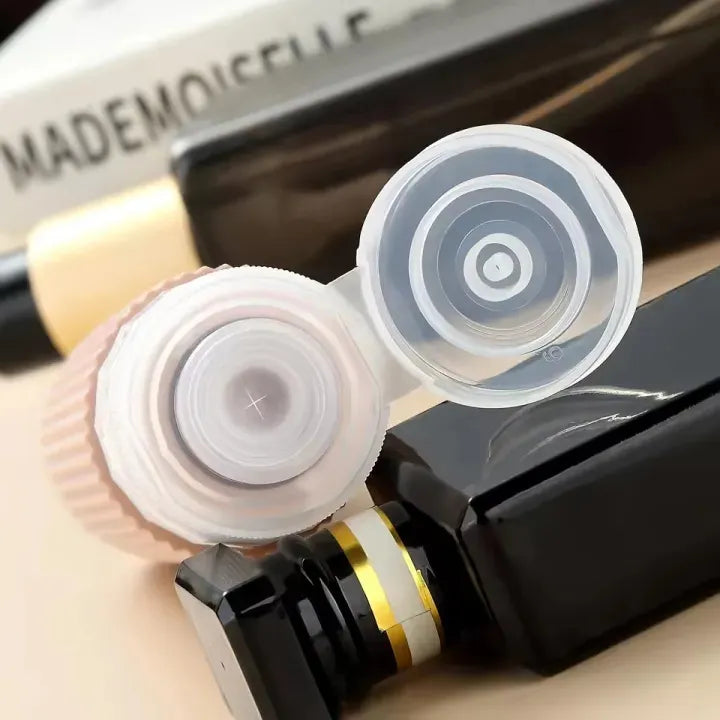 Close-up of a Mademoiselle product with silicone attachments on a blurred background
